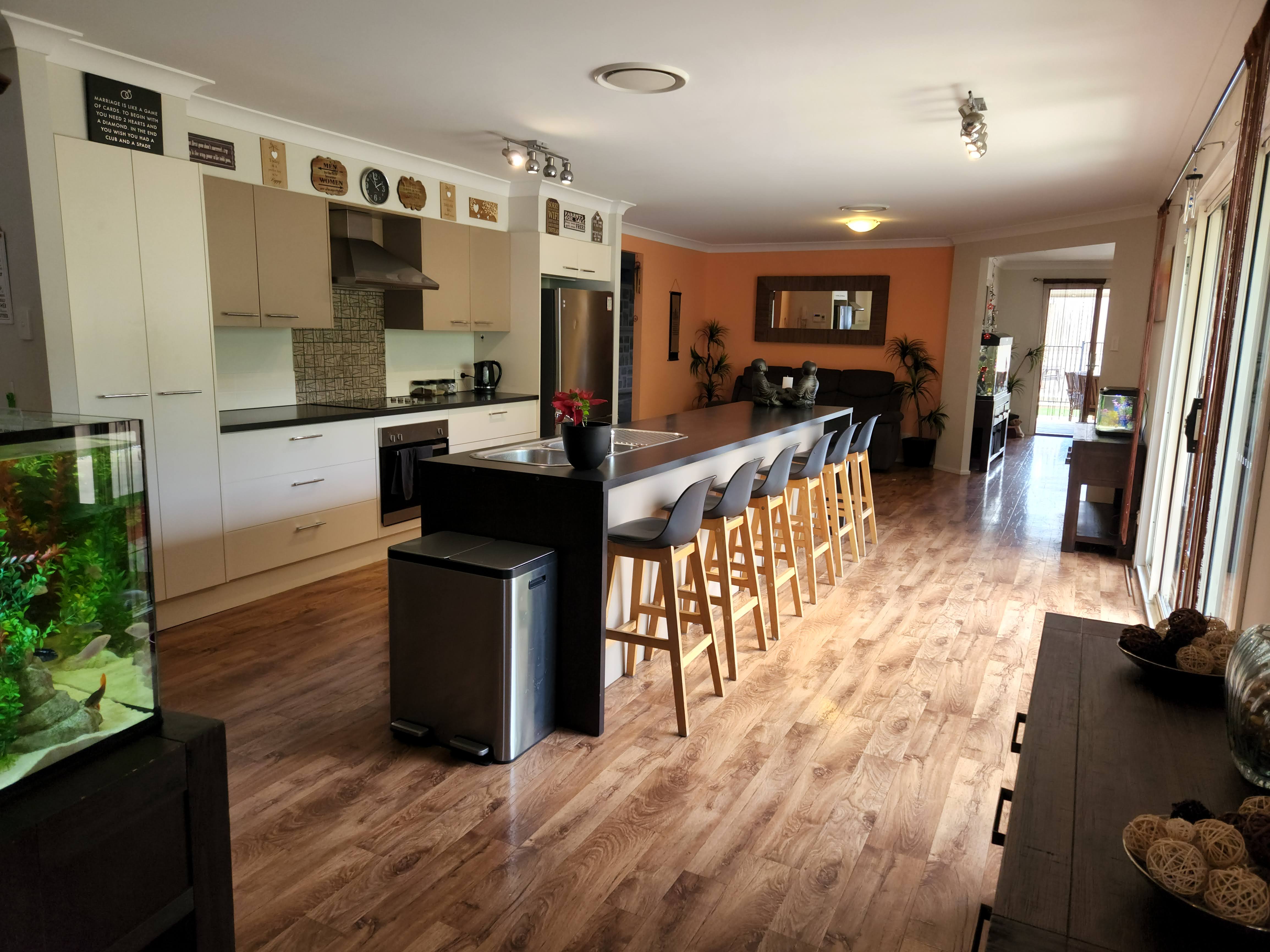 Open plan Large kitchen that overlooks the lake and the pool.